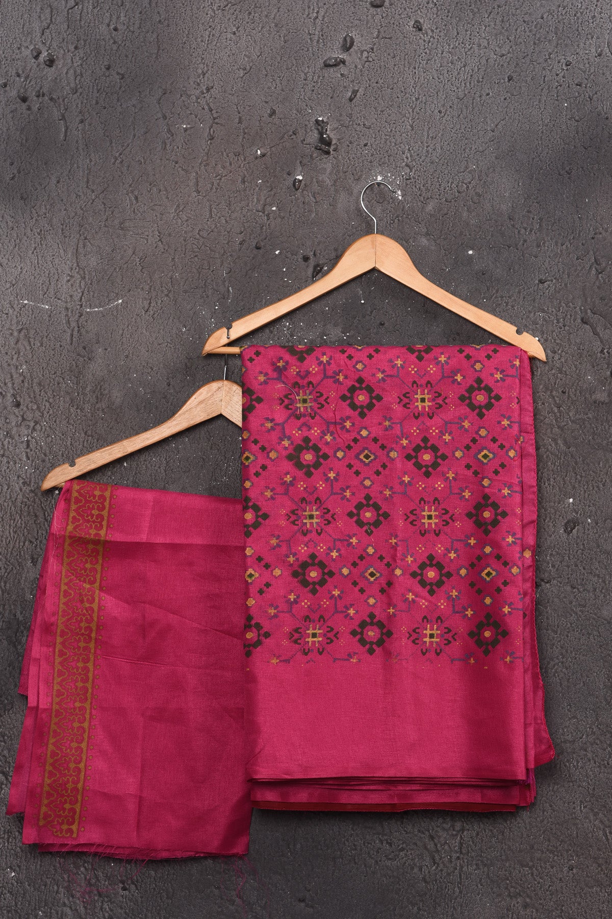 Buy stunning fuschia pink Patola print saree online in USA. Keep your ethnic wardrobe up to date with latest designer sarees, pure silk sarees, handwoven sarees, tussar silk sarees, embroidered sarees, chiffon saris from Pure Elegance Indian saree store in USA.-blouse