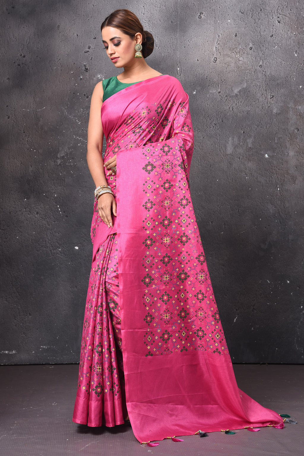 Buy stunning fuschia pink Patola print saree online in USA. Keep your ethnic wardrobe up to date with latest designer sarees, pure silk sarees, handwoven sarees, tussar silk sarees, embroidered sarees, chiffon saris from Pure Elegance Indian saree store in USA.-full view