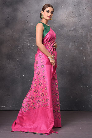 Buy stunning fuschia pink Patola print saree online in USA. Keep your ethnic wardrobe up to date with latest designer sarees, pure silk sarees, handwoven sarees, tussar silk sarees, embroidered sarees, chiffon saris from Pure Elegance Indian saree store in USA.-side