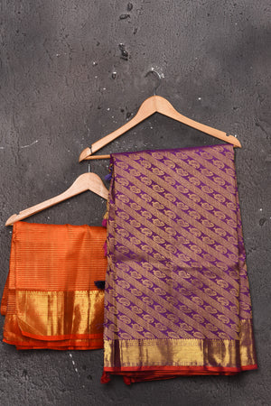 Buy beautiful purple handloom Kanjivaram sari online in USA with orange zari border. Keep your ethnic wardrobe up to date with latest designer sarees, pure silk sarees, handwoven sarees, tussar silk sarees, embroidered sarees, Banarasi saris from Pure Elegance Indian saree store in USA.-blouse