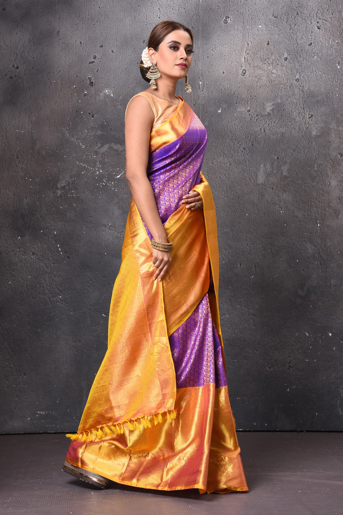 Buy beautiful purple Kanjeevaram silk saree online in USA with yellow zari border. Look elegant on festive occasions in beautiful designer sarees, pure silk sarees, Kanchipuram silk sarees, handloom sarees from Pure Elegance Indian fashion store in USA.-side