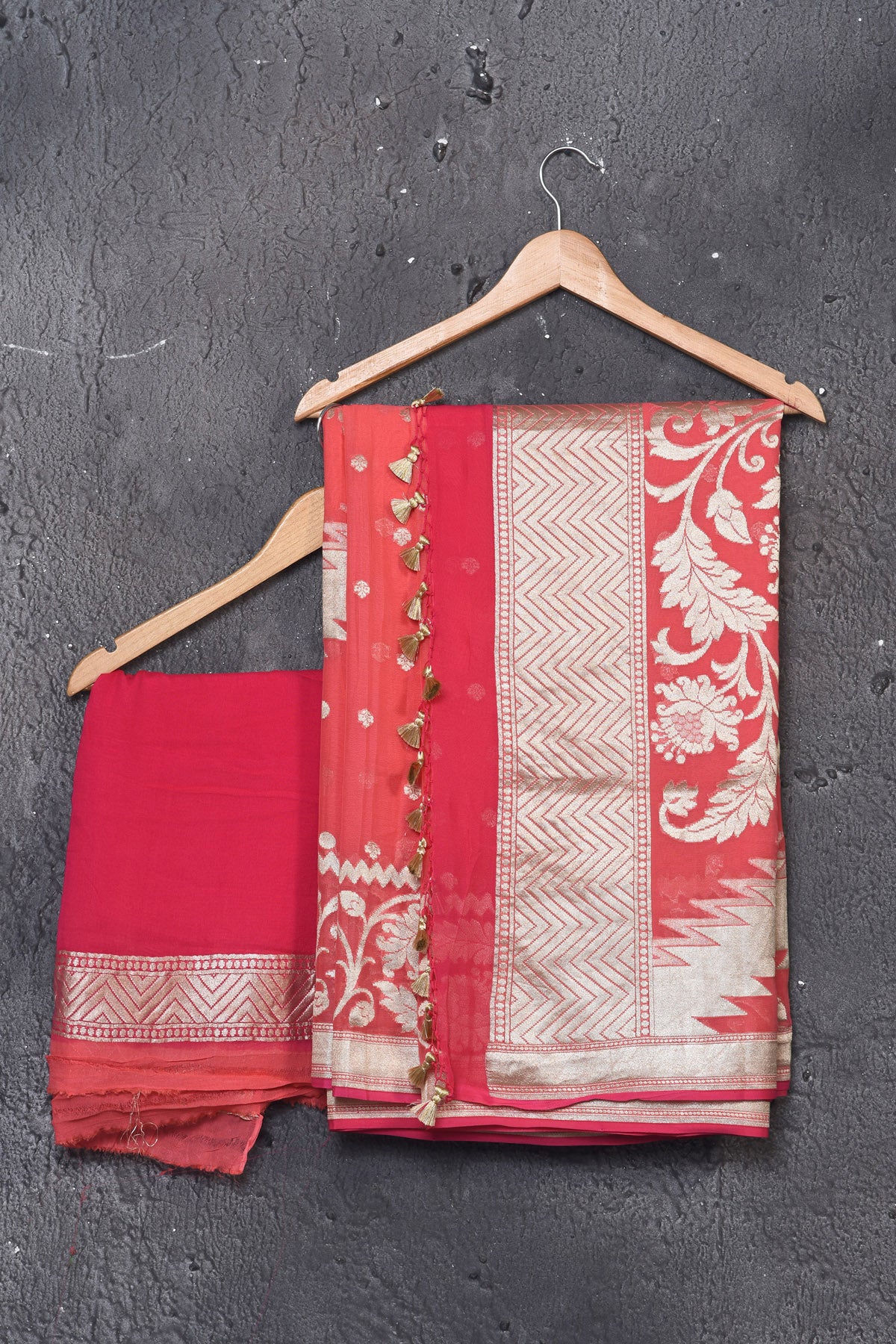 Buy beautiful salmon pink fancy georgette saree online in USA with zari work. Keep your ethnic wardrobe updated with latest designer sarees, pure silk sarees, handwoven sarees, tussar silk sarees, embroidered sarees from Pure Elegance Indian saree store in USA.-blouse