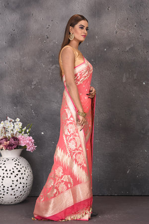 Buy beautiful salmon pink fancy georgette saree online in USA with zari work. Keep your ethnic wardrobe updated with latest designer sarees, pure silk sarees, handwoven sarees, tussar silk sarees, embroidered sarees from Pure Elegance Indian saree store in USA.-side