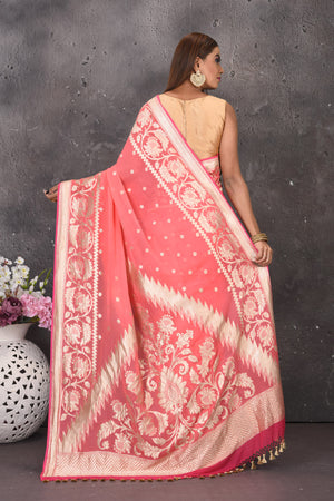 Buy beautiful salmon pink fancy georgette saree online in USA with zari work. Keep your ethnic wardrobe updated with latest designer sarees, pure silk sarees, handwoven sarees, tussar silk sarees, embroidered sarees from Pure Elegance Indian saree store in USA.-back