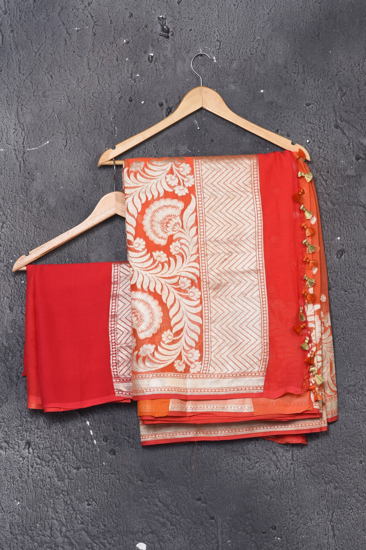 Buy stunning orange fancy georgette saree online in USA with zari work. Keep your ethnic wardrobe updated with latest designer sarees, pure silk sarees, handwoven sarees, tussar silk sarees, embroidered sarees from Pure Elegance Indian saree store in USA.-blouse