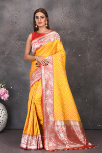 Shop beautiful yellow fancy Katan silk saree online in USA with red zari border. Keep your ethnic wardrobe updated with latest designer sarees, pure silk sarees, handwoven sarees, tussar silk sarees, embroidered sarees from Pure Elegance Indian saree store in USA.-full view