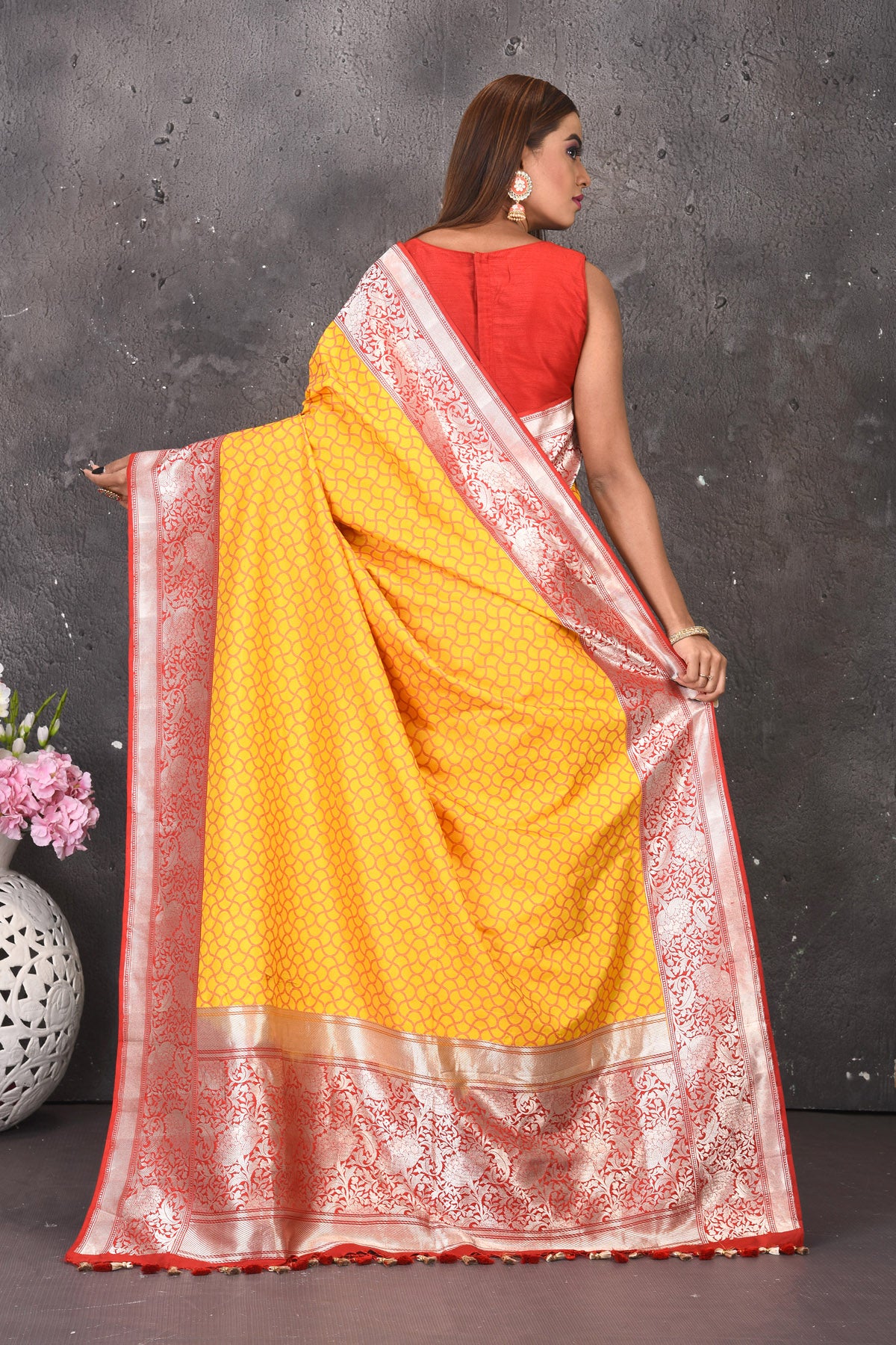 Shop beautiful yellow fancy Katan silk saree online in USA with red zari border. Keep your ethnic wardrobe updated with latest designer sarees, pure silk sarees, handwoven sarees, tussar silk sarees, embroidered sarees from Pure Elegance Indian saree store in USA.-back