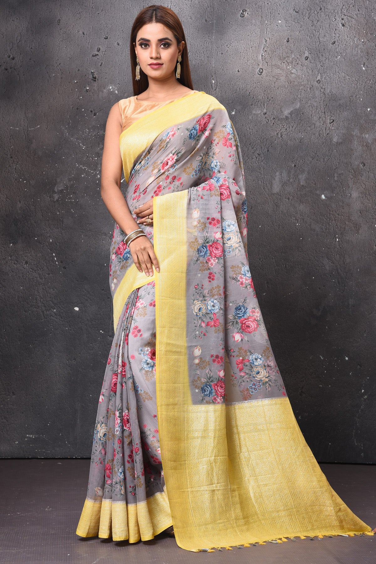 Buy beautiful light grey floral chiffon saree online in USA with yellow zari border. Keep your ethnic wardrobe up to date with latest designer sarees, pure silk sarees, handwoven sarees, tussar silk sarees, embroidered sarees, chiffon saris from Pure Elegance Indian saree store in USA.-full view