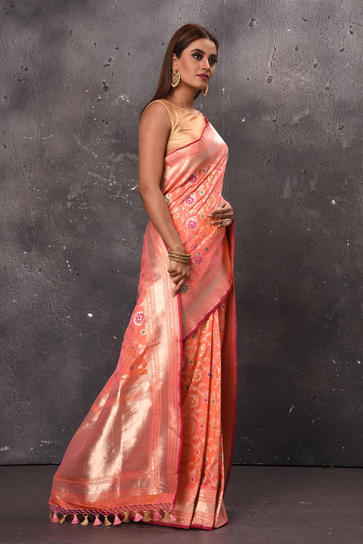 Buy gorgeous peach Katan silk saree online in USA with zari minakari work. Keep your ethnic wardrobe up to date with latest designer sarees, pure silk sarees, handwoven sarees, tussar silk sarees, embroidered sarees, chiffon saris from Pure Elegance Indian saree store in USA.-side