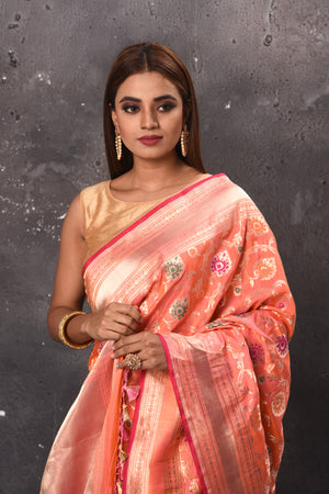 Buy gorgeous peach Katan silk saree online in USA with zari minakari work. Keep your ethnic wardrobe up to date with latest designer sarees, pure silk sarees, handwoven sarees, tussar silk sarees, embroidered sarees, chiffon saris from Pure Elegance Indian saree store in USA.-closeup
