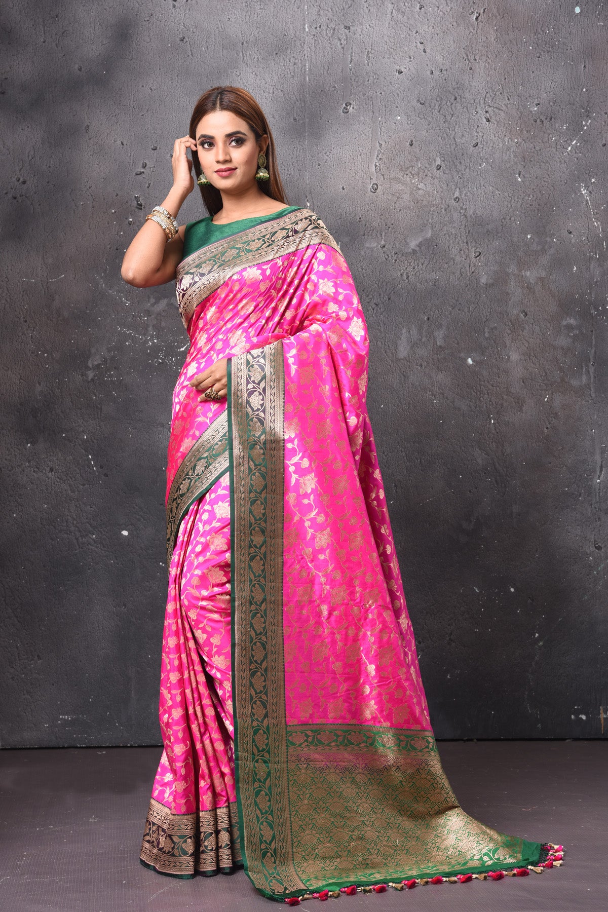 Shop gorgeous bright pink Katan silk saree online in USA with green zari border and pallu. Keep your ethnic wardrobe up to date with latest designer sarees, pure silk sarees, handwoven sarees, tussar silk sarees, embroidered sarees, chiffon saris from Pure Elegance Indian saree store in USA.-full view