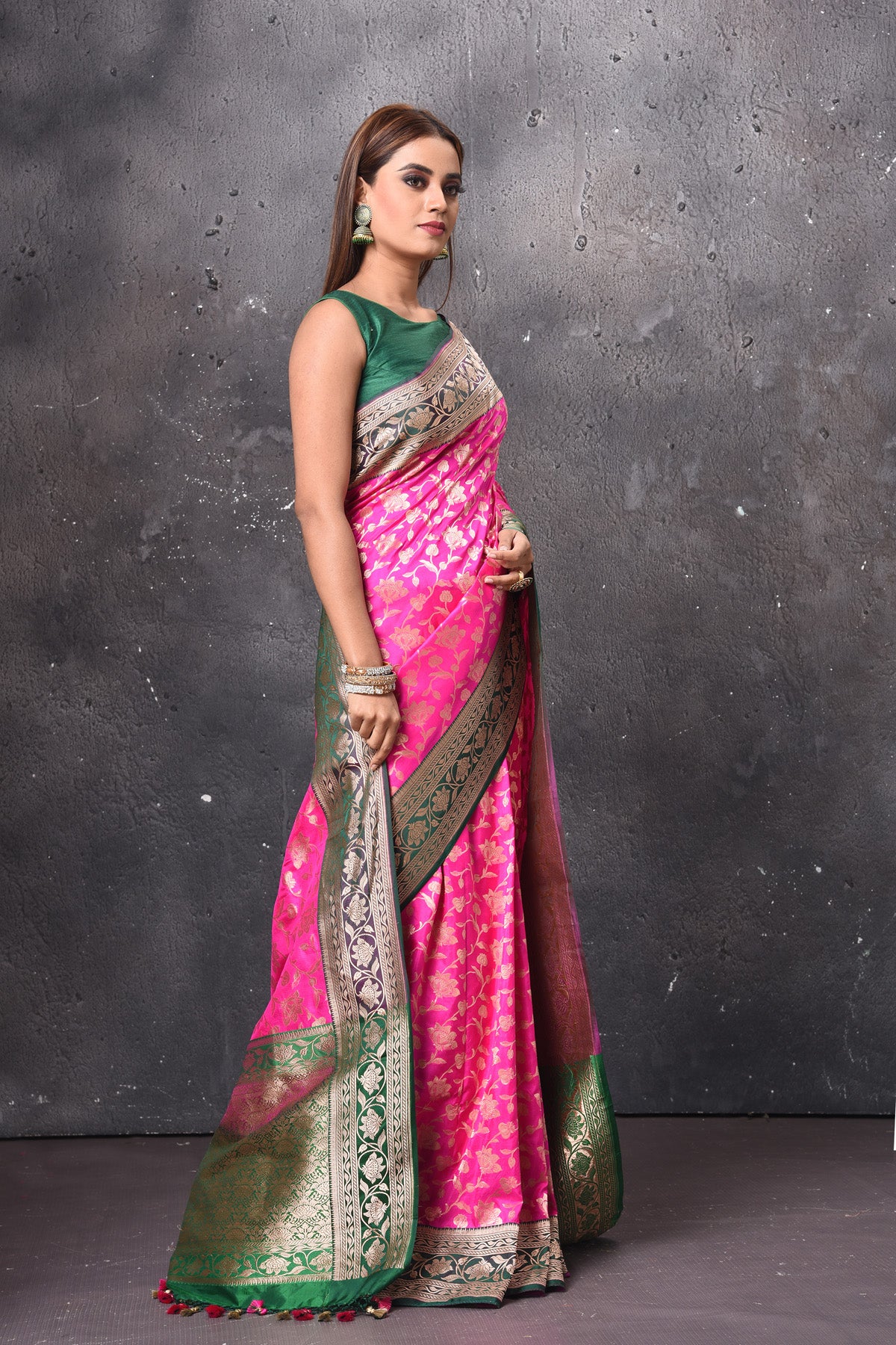 Shop gorgeous bright pink Katan silk saree online in USA with green zari border and pallu. Keep your ethnic wardrobe up to date with latest designer sarees, pure silk sarees, handwoven sarees, tussar silk sarees, embroidered sarees, chiffon saris from Pure Elegance Indian saree store in USA.-side