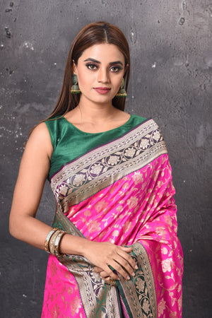 Shop gorgeous bright pink Katan silk saree online in USA with green zari border and pallu. Keep your ethnic wardrobe up to date with latest designer sarees, pure silk sarees, handwoven sarees, tussar silk sarees, embroidered sarees, chiffon saris from Pure Elegance Indian saree store in USA.-closeup