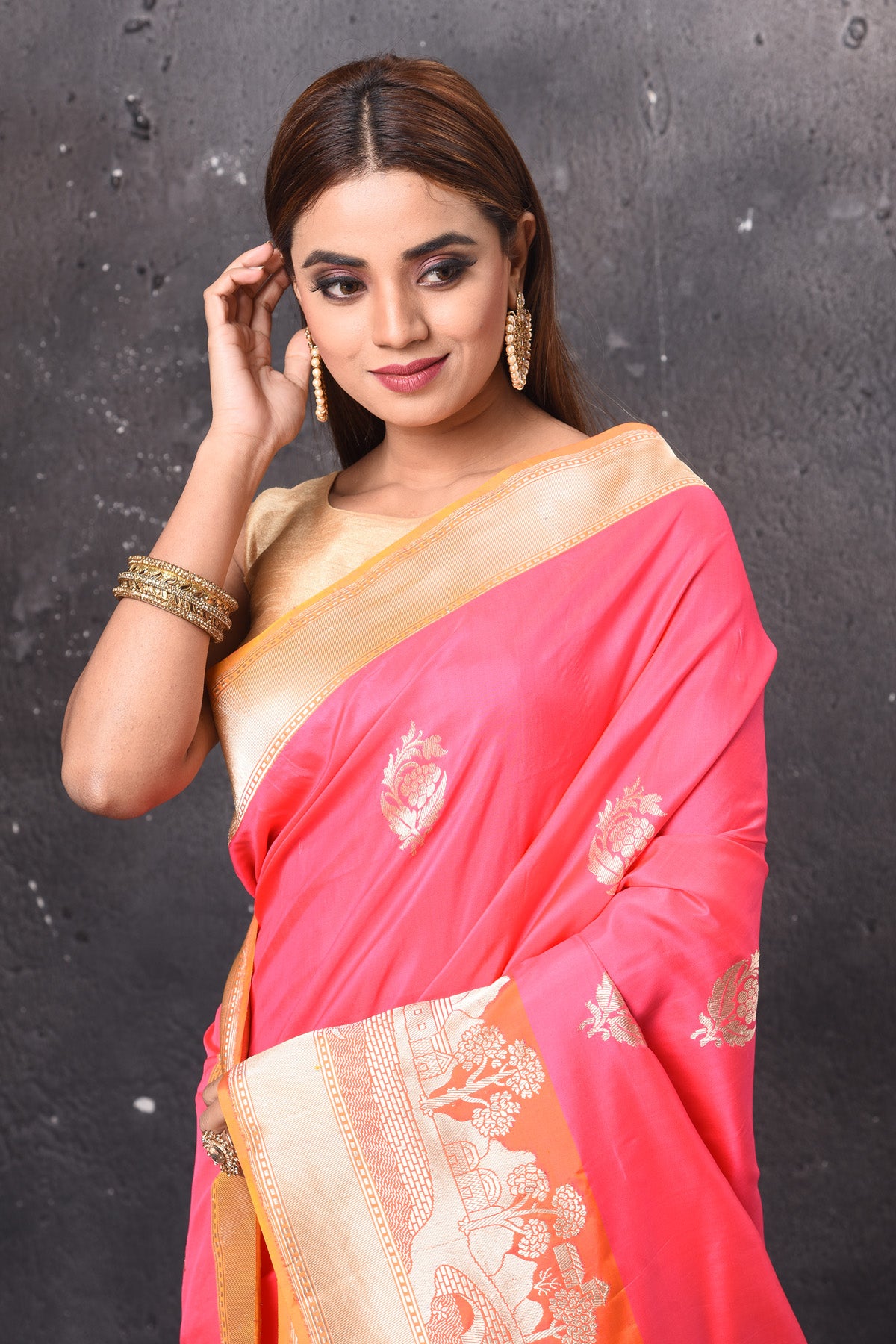 Buy stunning pink Katan silk saree online in USA with zari border and pallu. Keep your ethnic wardrobe up to date with latest designer sarees, pure silk sarees, handwoven sarees, tussar silk sarees, embroidered sarees, chiffon saris from Pure Elegance Indian saree store in USA.-closeup