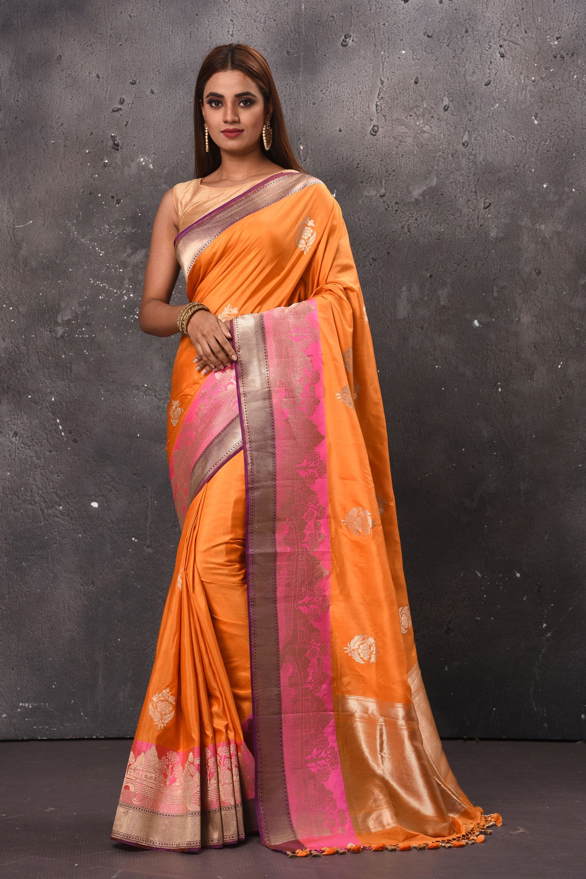 Buy beautiful orange Katan silk saree online in USA with pink zari border and pallu. Keep your ethnic wardrobe up to date with latest designer sarees, pure silk sarees, handwoven sarees, tussar silk sarees, embroidered sarees, chiffon saris from Pure Elegance Indian saree store in USA.-full view