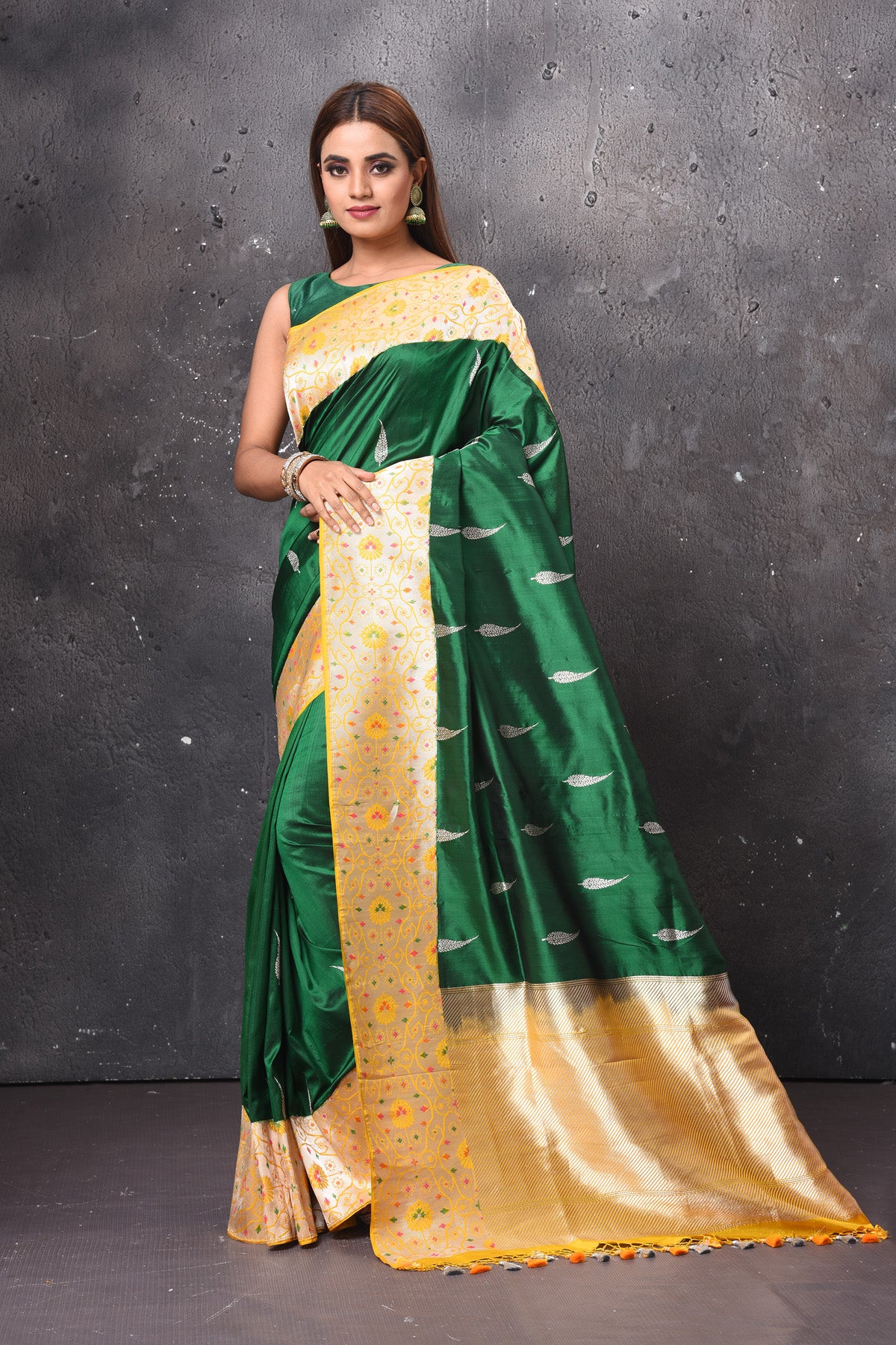 Buy beautiful dark green Katan silk sari online in USA with zari minakari yellow border. Keep your ethnic wardrobe up to date with latest designer sarees, pure silk sarees, handwoven sarees, tussar silk sarees, embroidered saris, chiffon saris from Pure Elegance Indian saree store in USA.-full view