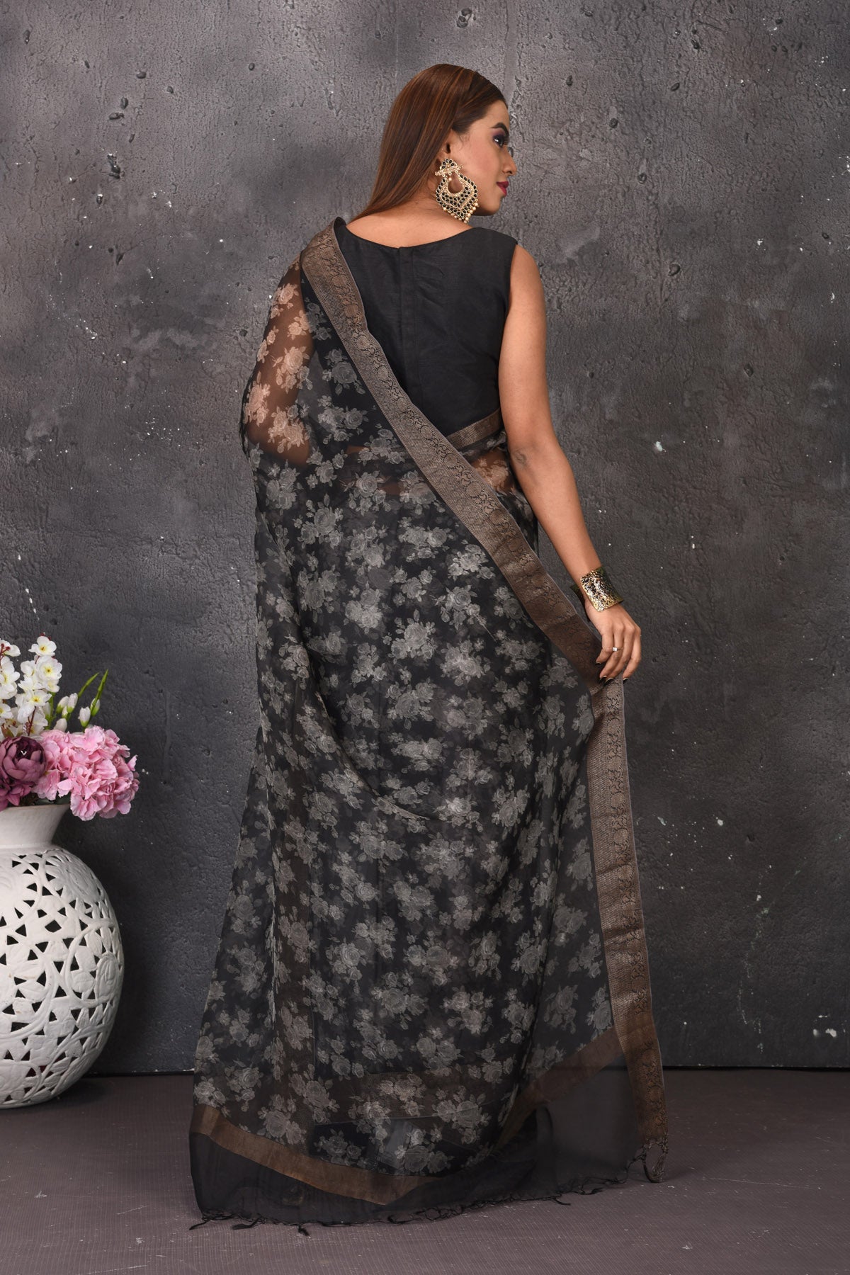 Buy stunning black and white printed saree online in USA with zari border. Keep your ethnic wardrobe up to date with latest designer sarees, pure silk sarees, handwoven sarees, tussar silk sares, embroidered sarees from Pure Elegance Indian saree store in USA.-back