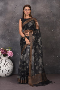 Buy beautiful black and white floral print saree online in USA with zari border. Keep your ethnic wardrobe up to date with latest designer sarees, pure silk sarees, handwoven sarees, tussar silk sares, embroidered sarees from Pure Elegance Indian saree store in USA.-full view