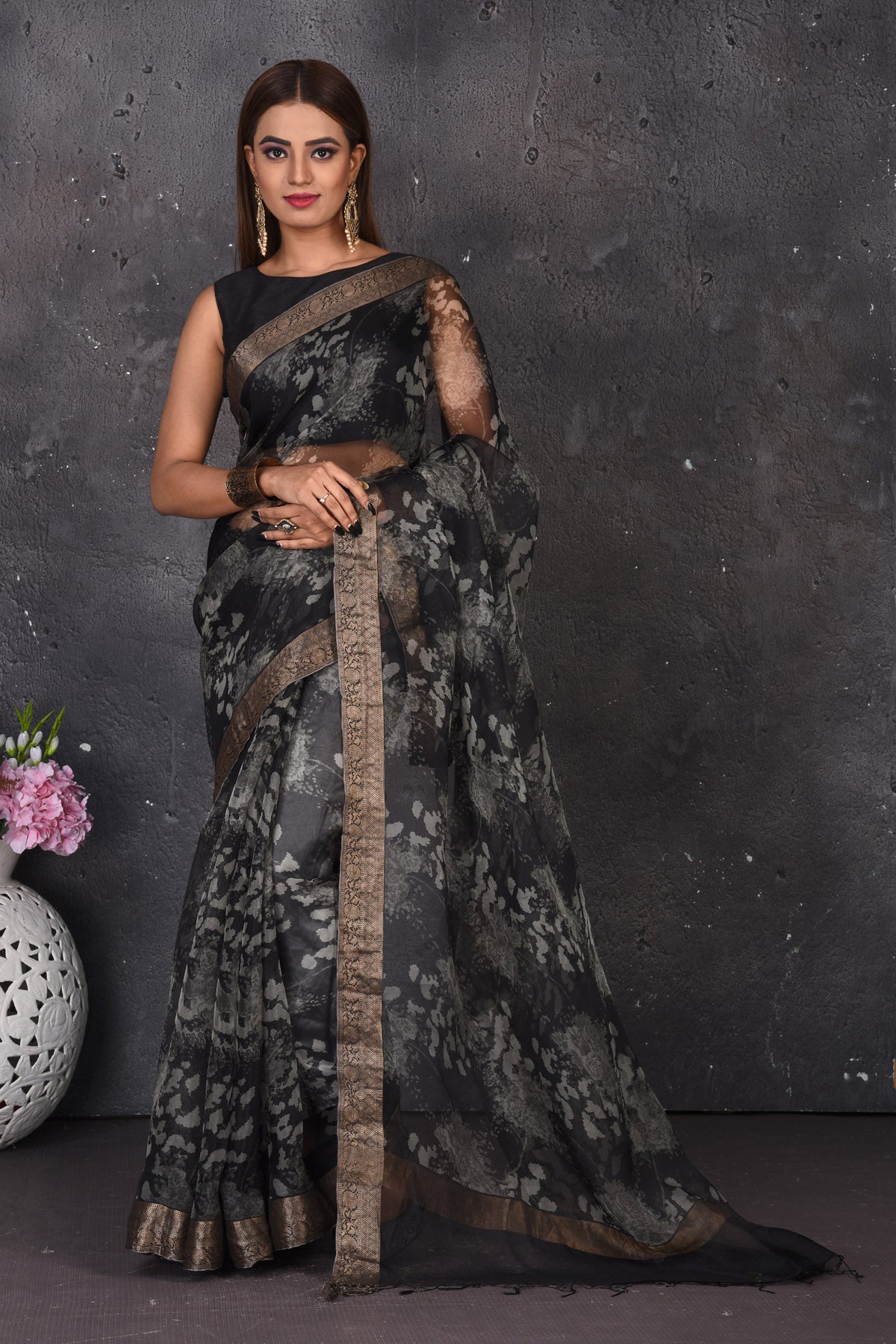 Buy stunning black and white printed sari online in USA with zari border. Keep your ethnic wardrobe up to date with latest designer sarees, pure silk sarees, handwoven sarees, tussar silk sares, embroidered sarees from Pure Elegance Indian saree store in USA.-full view