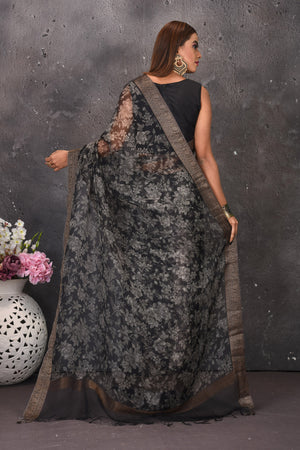 Buy stunning black and white printed floral sari online in USA with zari border. Keep your ethnic wardrobe up to date with latest designer sarees, pure silk sarees, handwoven sarees, tussar silk sares, embroidered sarees from Pure Elegance Indian saree store in USA.-back