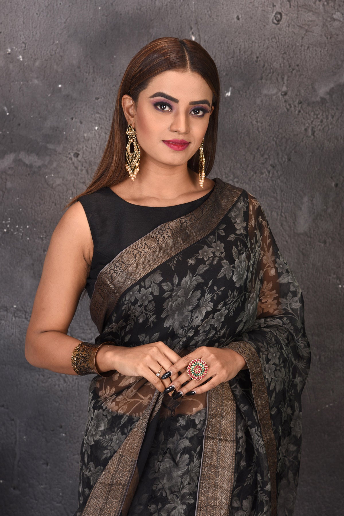 Buy stunning black and white printed floral sari online in USA with zari border. Keep your ethnic wardrobe up to date with latest designer sarees, pure silk sarees, handwoven sarees, tussar silk sares, embroidered sarees from Pure Elegance Indian saree store in USA.-closeup