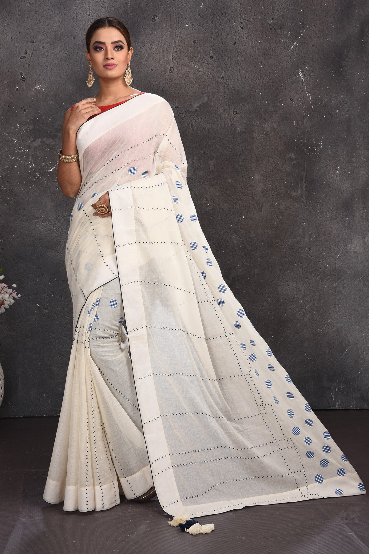 Shop stunning off-white polka dot applique linen saree online in USA. Keep your ethnic wardrobe up to date with latest designer sarees, pure silk sarees, handwoven sarees, tussar silk sarees, embroidered sarees from Pure Elegance Indian saree store in USA.-full view