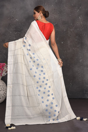 Shop stunning off-white polka dot applique linen saree online in USA. Keep your ethnic wardrobe up to date with latest designer sarees, pure silk sarees, handwoven sarees, tussar silk sarees, embroidered sarees from Pure Elegance Indian saree store in USA.-back