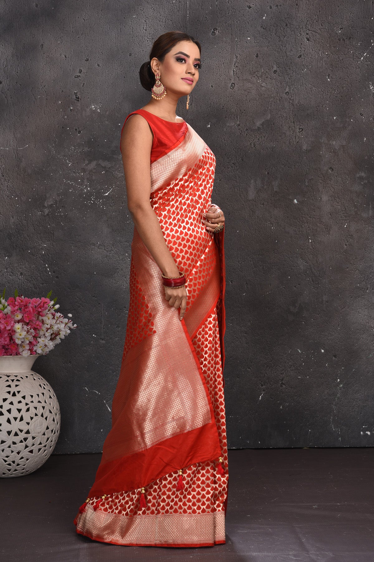 Shop stunning red Banarasi silk saree online in USA with zari border. Keep your ethnic wardrobe up to date with latest designer sarees, pure silk sarees, handwoven sarees, tussar silk sarees, embroidered sarees from Pure Elegance Indian saree store in USA.-side