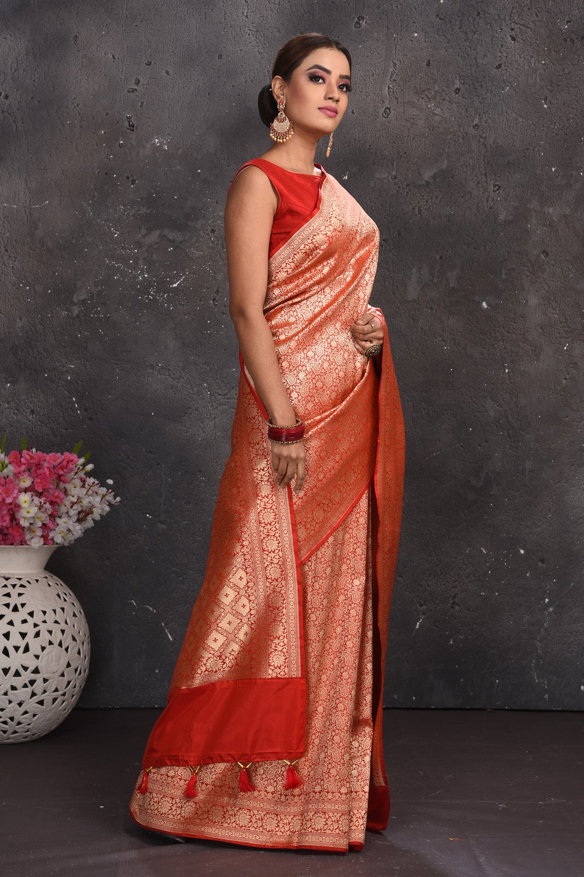 Buy stunning red heavy Banarasi silk saree online in USA. Keep your ethnic wardrobe up to date with latest designer sarees, pure silk sarees, handwoven sarees, tussar silk sarees, embroidered sarees from Pure Elegance Indian saree store in USA.-side