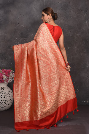 Buy stunning red heavy Banarasi silk saree online in USA. Keep your ethnic wardrobe up to date with latest designer sarees, pure silk sarees, handwoven sarees, tussar silk sarees, embroidered sarees from Pure Elegance Indian saree store in USA.-back