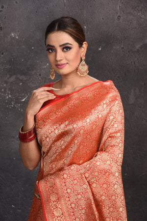 Buy stunning red heavy Banarasi silk saree online in USA. Keep your ethnic wardrobe up to date with latest designer sarees, pure silk sarees, handwoven sarees, tussar silk sarees, embroidered sarees from Pure Elegance Indian saree store in USA.-closeup