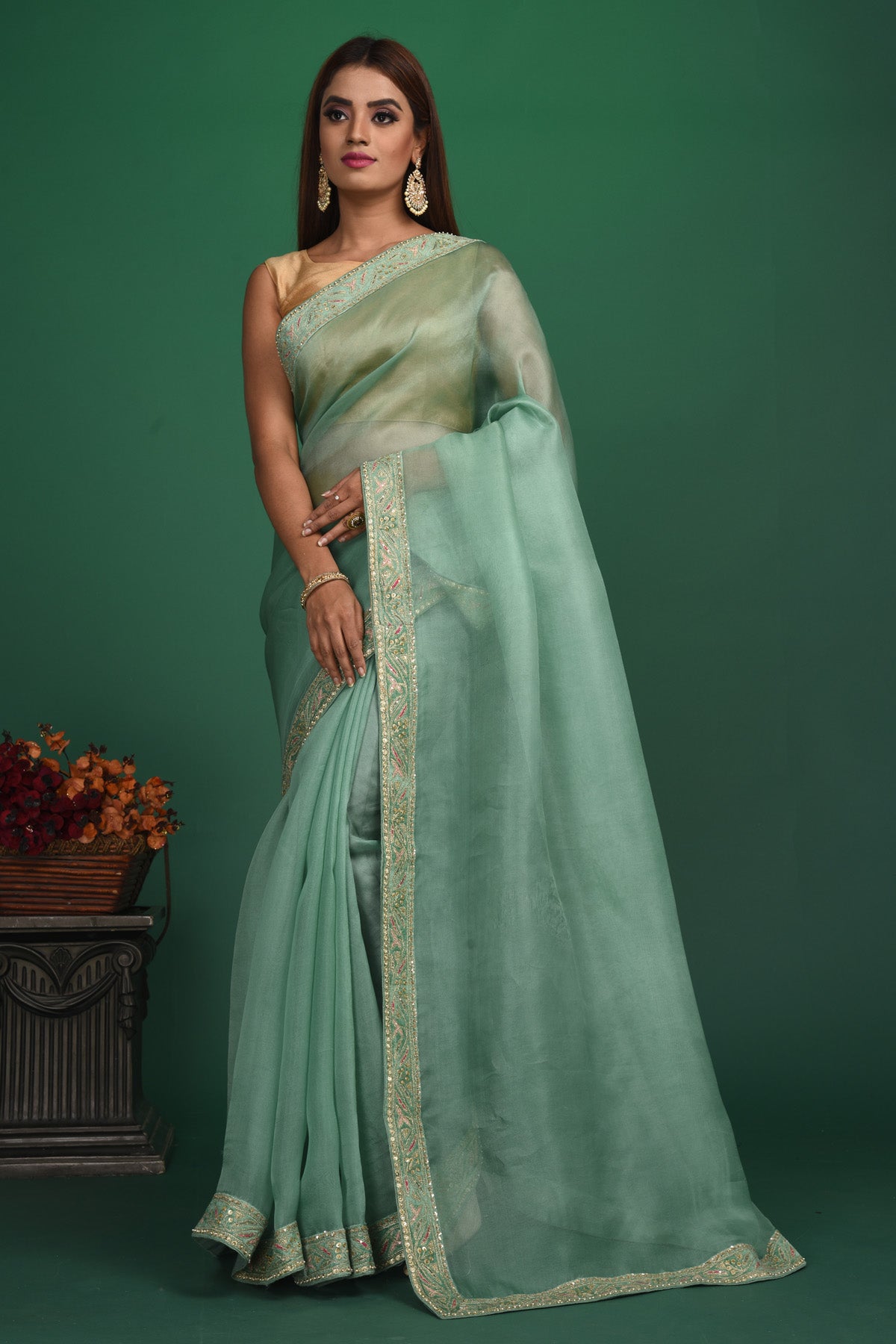 Buy beautiful sage green organza sari online in USA with heavy embroidery blouse. Keep your ethnic wardrobe up to date with latest designer sarees, pure silk sarees, handwoven sarees, tussar silk sarees, embroidered sarees, organza saris from Pure Elegance Indian saree store in USA.-full view