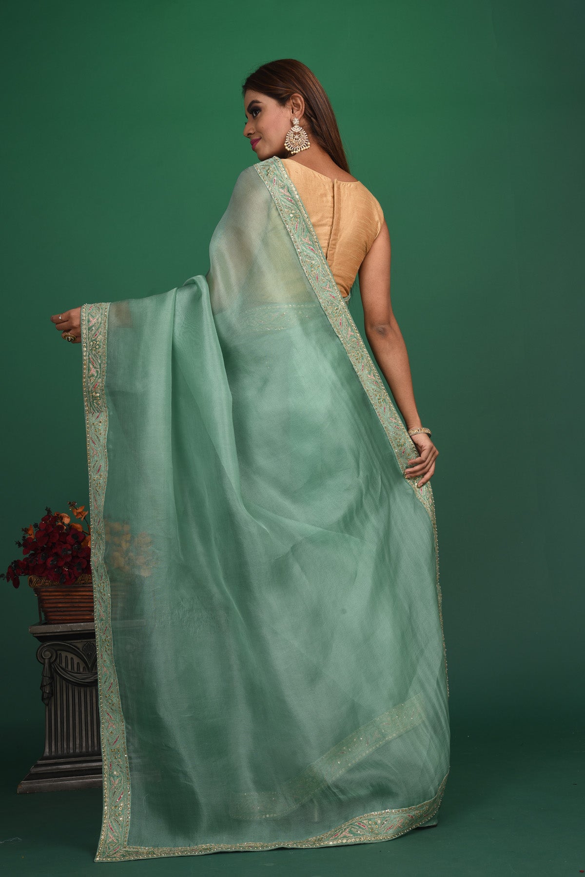 Buy beautiful sage green organza sari online in USA with heavy embroidery blouse. Keep your ethnic wardrobe up to date with latest designer sarees, pure silk sarees, handwoven sarees, tussar silk sarees, embroidered sarees, organza saris from Pure Elegance Indian saree store in USA.-back