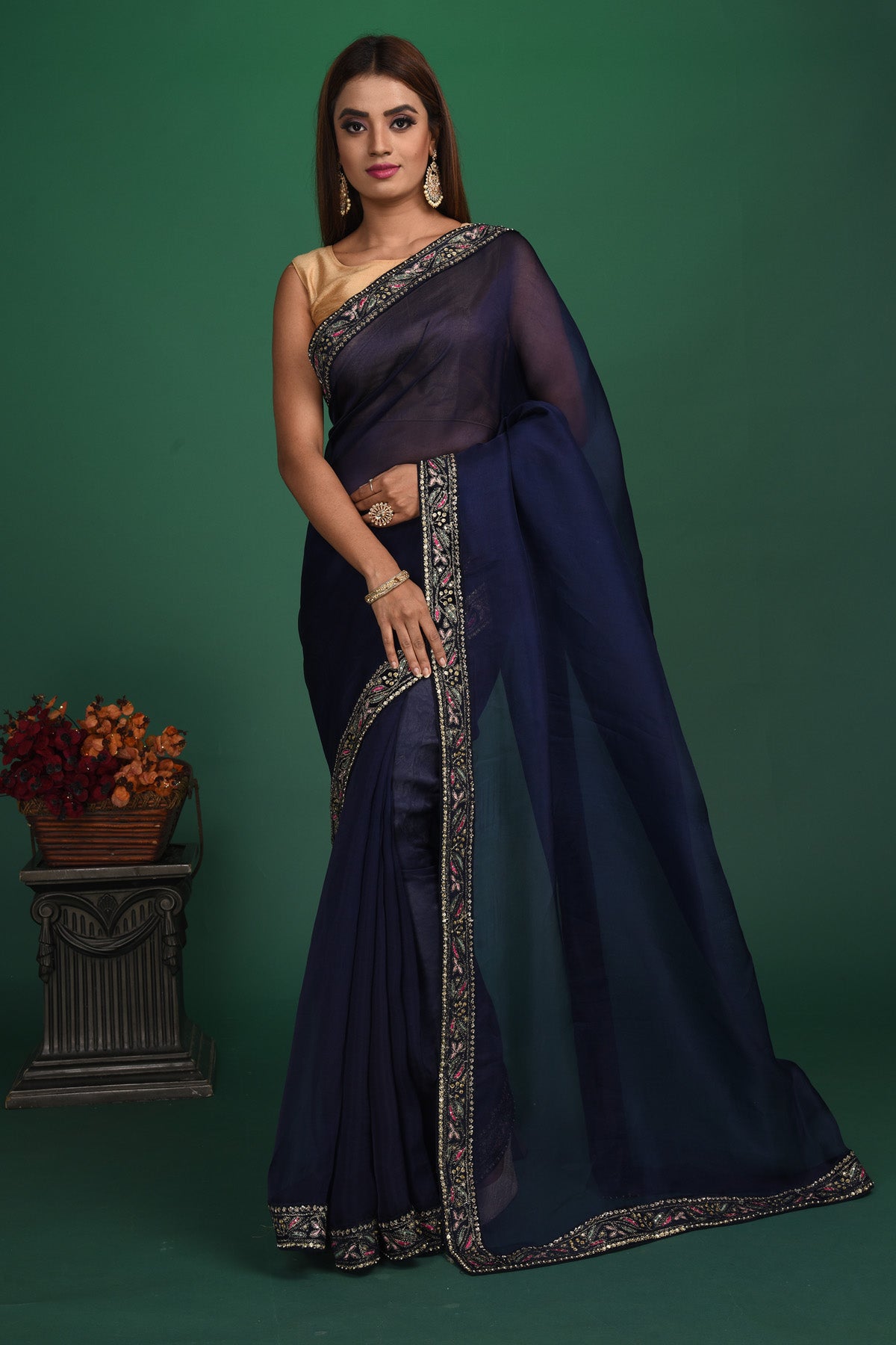 Buy stunning navy blue organza sari online in USA with heavy embroidery blouse. Keep your ethnic wardrobe up to date with latest designer sarees, pure silk sarees, handwoven sarees, tussar silk sarees, embroidered sarees, organza saris from Pure Elegance Indian saree store in USA.-full view