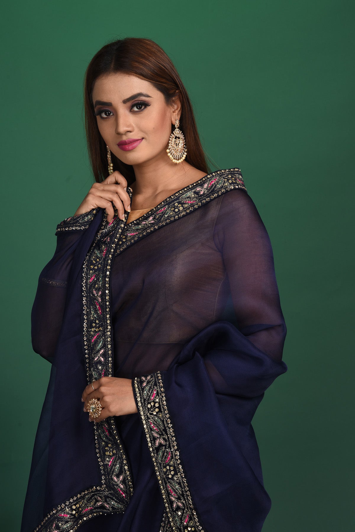 Buy stunning navy blue organza sari online in USA with heavy embroidery blouse. Keep your ethnic wardrobe up to date with latest designer sarees, pure silk sarees, handwoven sarees, tussar silk sarees, embroidered sarees, organza saris from Pure Elegance Indian saree store in USA.-closeup