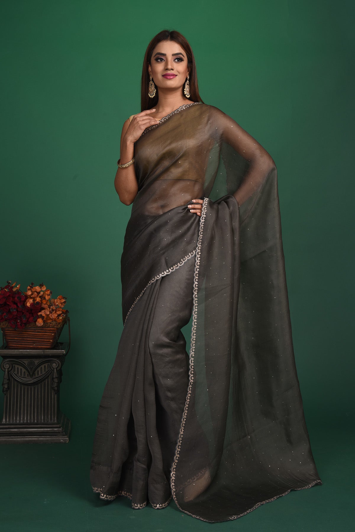 Buy stunning dark grey organza sari online in USA with heavy embroidery blouse. Keep your ethnic wardrobe up to date with latest designer sarees, pure silk sarees, handwoven sarees, tussar silk sarees, embroidered sarees, organza saris from Pure Elegance Indian saree store in USA.-full view