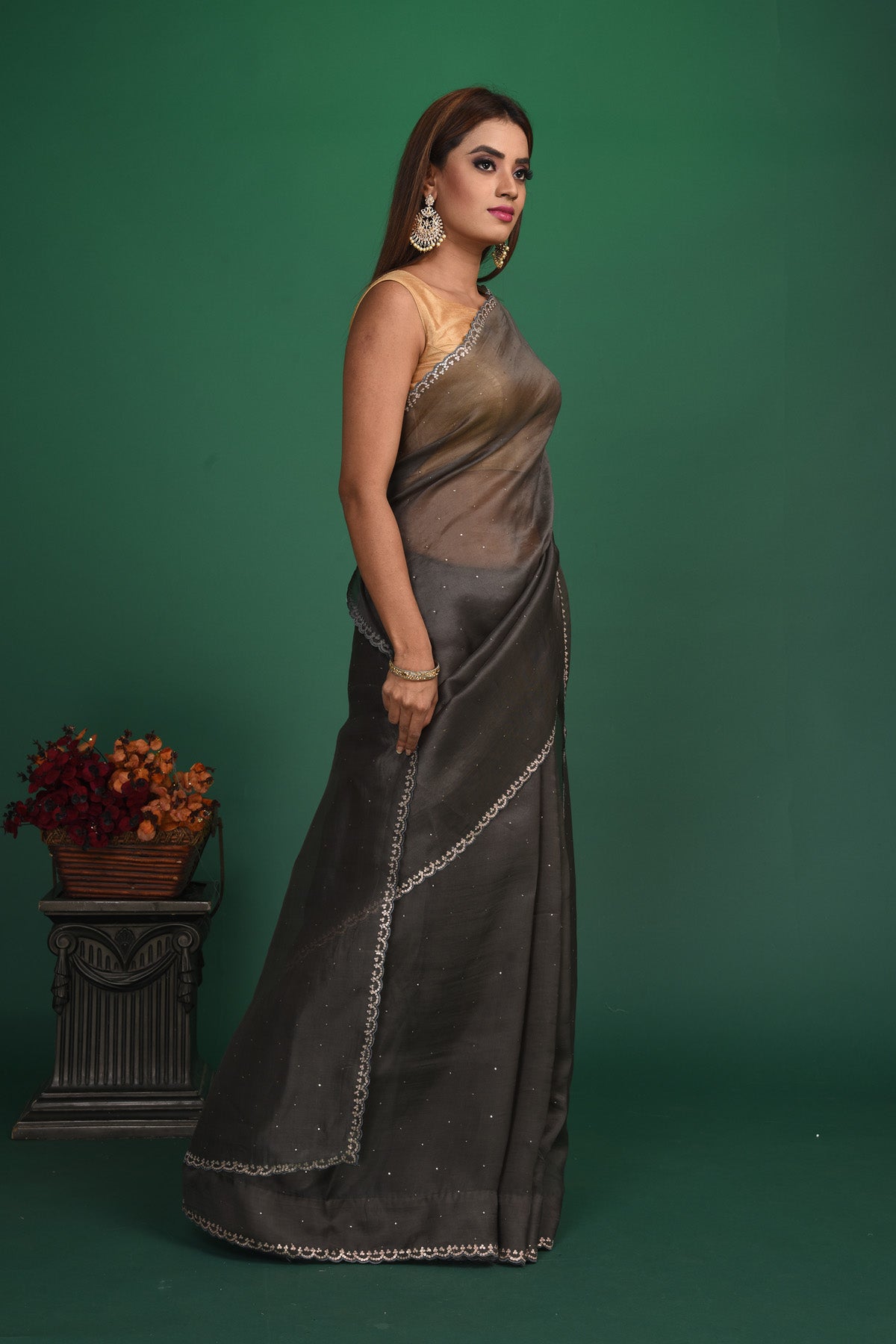 Buy stunning dark grey organza sari online in USA with heavy embroidery blouse. Keep your ethnic wardrobe up to date with latest designer sarees, pure silk sarees, handwoven sarees, tussar silk sarees, embroidered sarees, organza saris from Pure Elegance Indian saree store in USA.-side