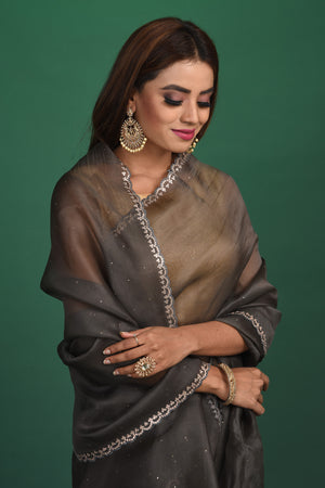 Buy stunning dark grey organza sari online in USA with heavy embroidery blouse. Keep your ethnic wardrobe up to date with latest designer sarees, pure silk sarees, handwoven sarees, tussar silk sarees, embroidered sarees, organza saris from Pure Elegance Indian saree store in USA.-closeup