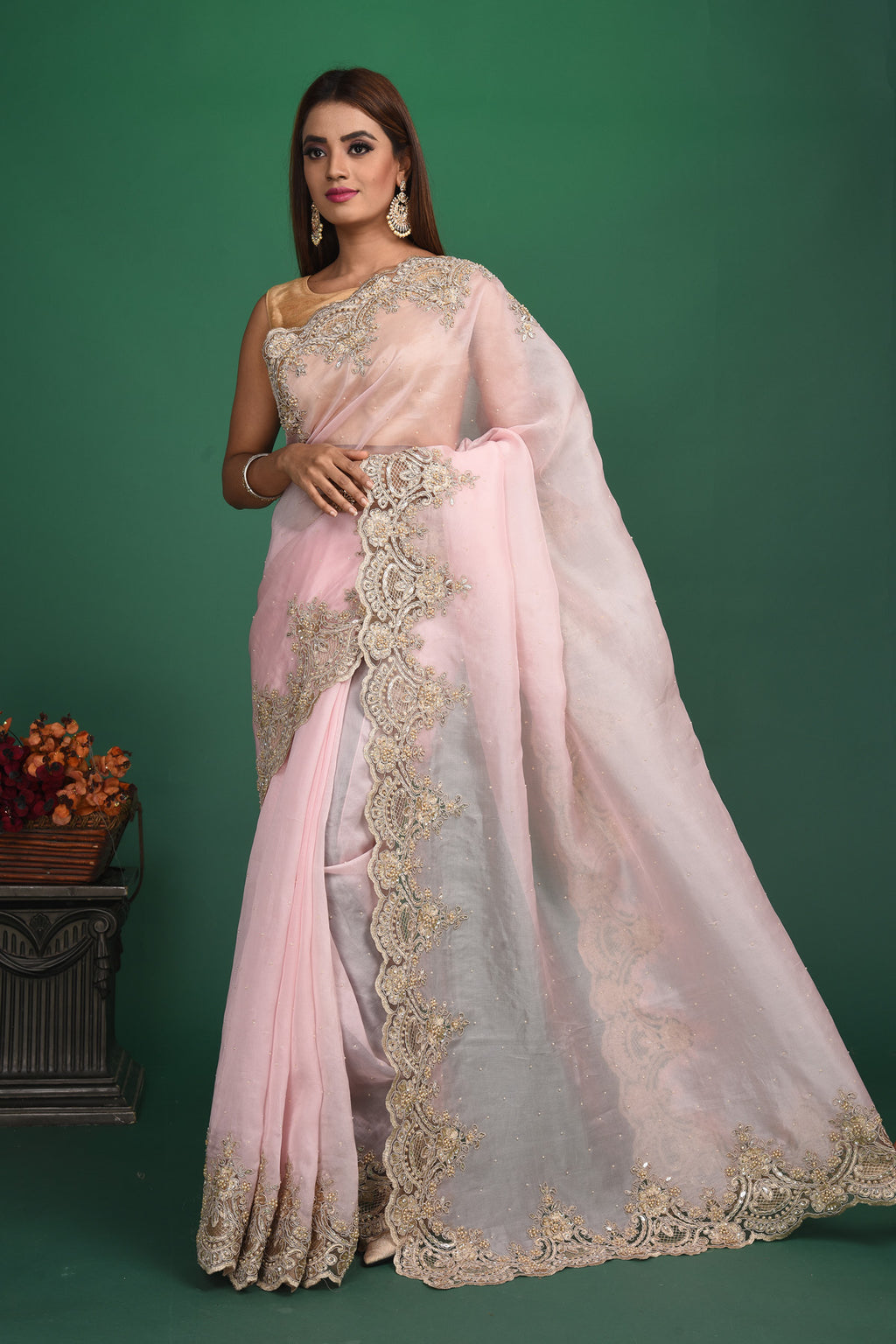 Shop beautiful powder pink embroidered organza sari online in USA. Keep your ethnic wardrobe up to date with latest designer sarees, pure silk sarees, handwoven sarees, tussar silk sarees, embroidered sarees, organza saris from Pure Elegance Indian saree store in USA.-full view