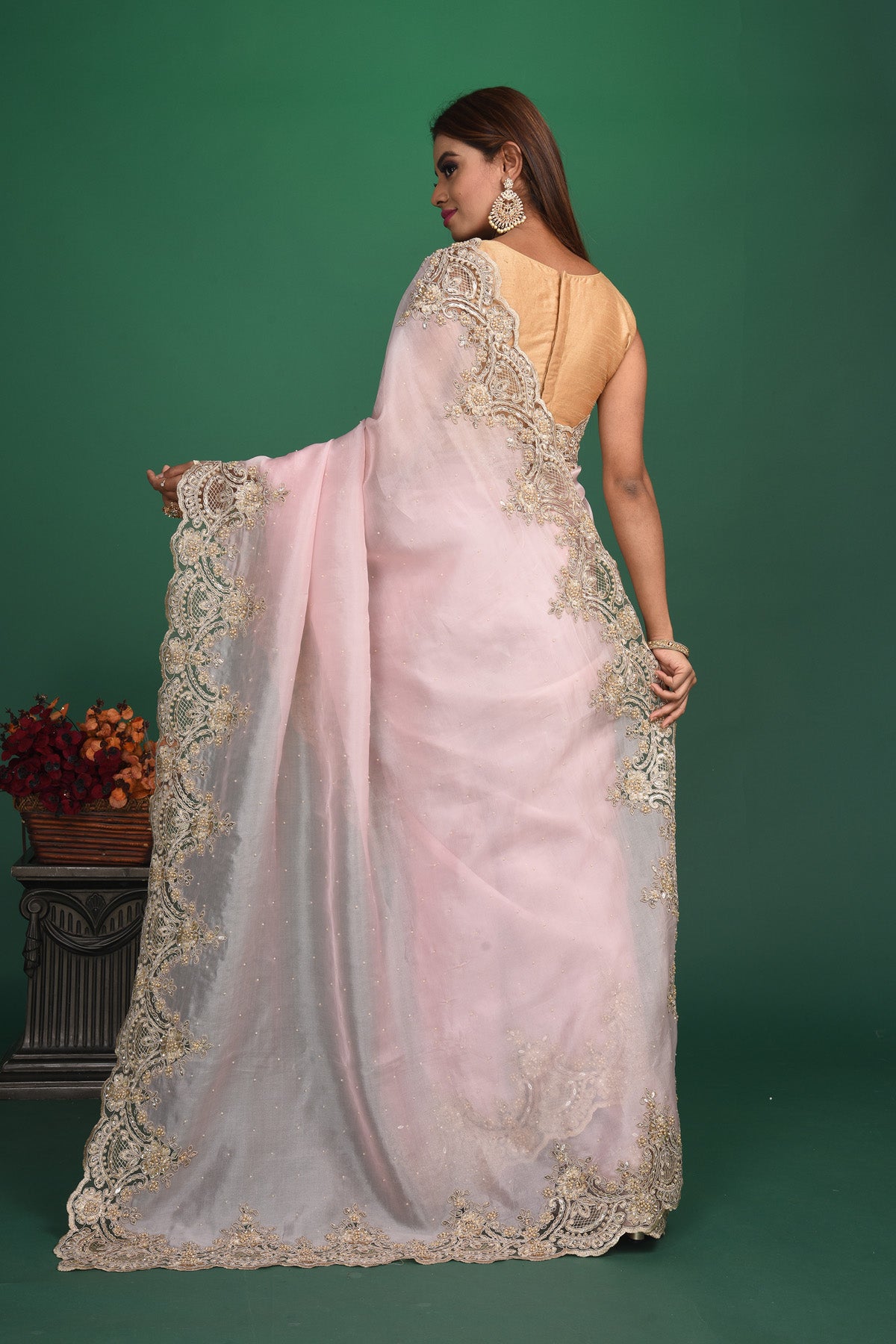 Shop beautiful powder pink embroidered organza sari online in USA. Keep your ethnic wardrobe up to date with latest designer sarees, pure silk sarees, handwoven sarees, tussar silk sarees, embroidered sarees, organza saris from Pure Elegance Indian saree store in USA.-back