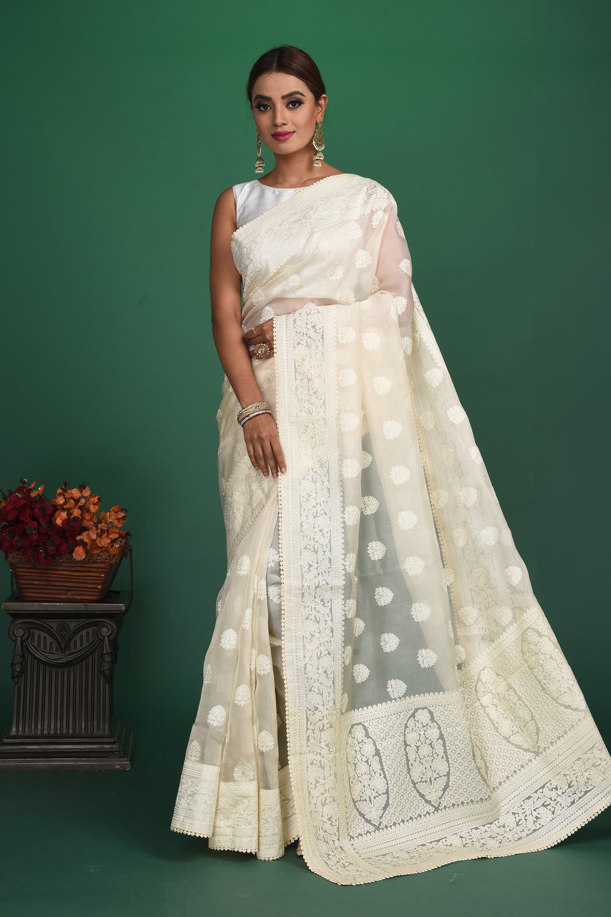 Shop stunning off-white Lucknowi georgette sari online in USA. Keep your ethnic wardrobe up to date with latest designer sarees, pure silk sarees, handwoven sarees, tussar silk sarees, embroidered sarees, organza saris from Pure Elegance Indian saree store in USA.-full view