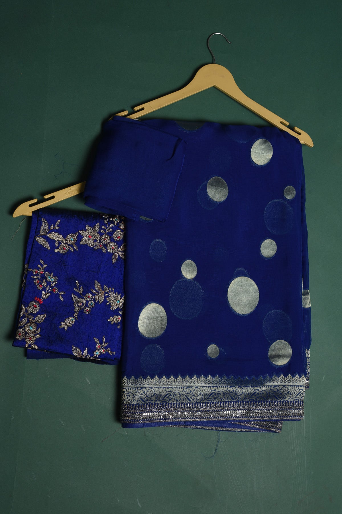Buy beautiful royal blue georgette Banarasi sari online in USA with silver zari border. Keep your ethnic wardrobe up to date with latest designer sarees, pure silk sarees, handwoven sarees, tussar silk sarees, embroidered sarees, organza saris from Pure Elegance Indian saree store in USA.-blouse