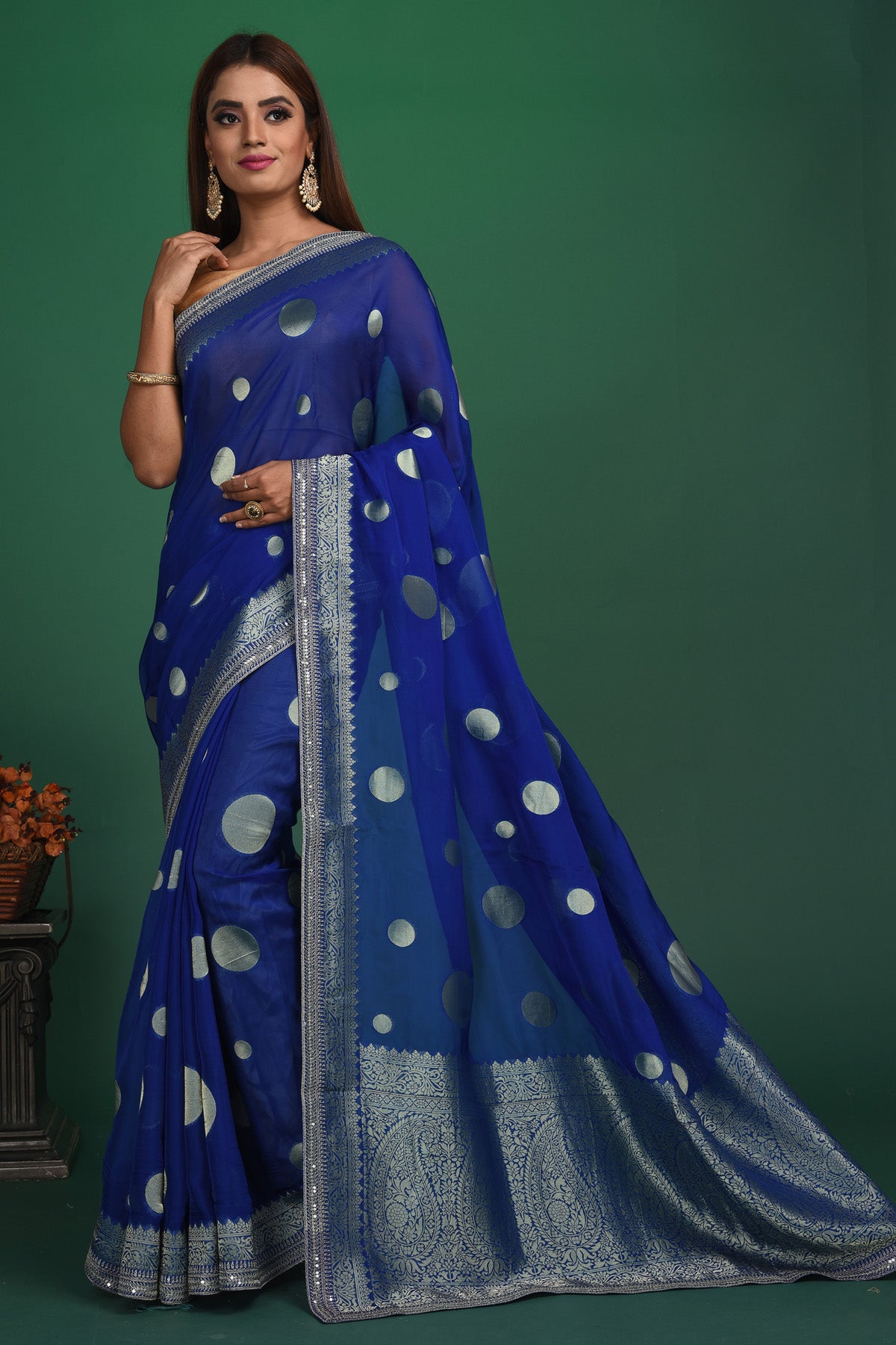 Buy beautiful royal blue georgette Banarasi sari online in USA with silver zari border. Keep your ethnic wardrobe up to date with latest designer sarees, pure silk sarees, handwoven sarees, tussar silk sarees, embroidered sarees, organza saris from Pure Elegance Indian saree store in USA.-full view