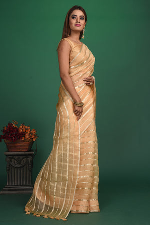 Buy stunning cream organza saree online in USA with multicolor blouse. Slay ethnic style on special occasions with beautiful designer sarees, handwoven sarees, embroidered sarees, party wear sarees, Bollywood sarees from Pure Elegance Indian saree store in USA.-side