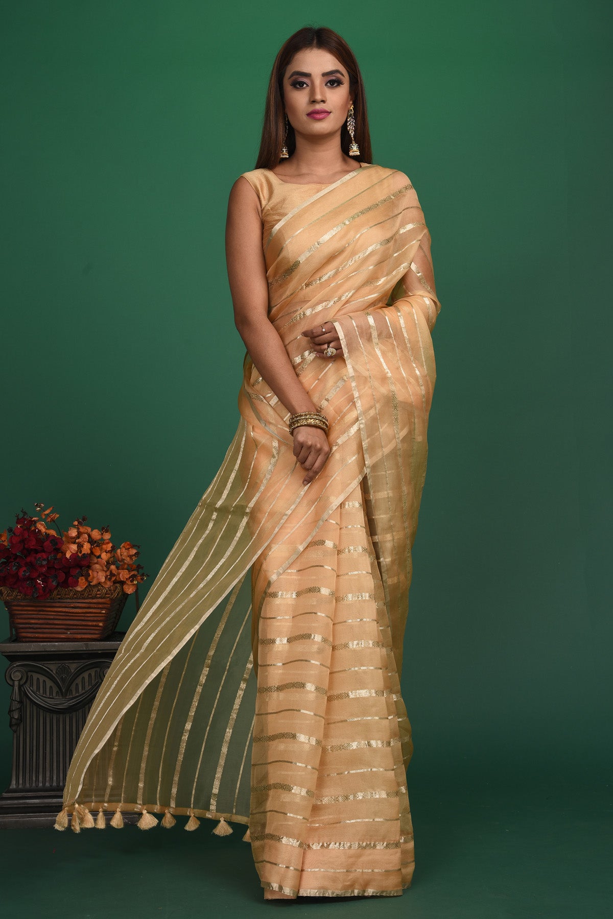 Buy stunning cream organza saree online in USA with multicolor blouse. Slay ethnic style on special occasions with beautiful designer sarees, handwoven sarees, embroidered sarees, party wear sarees, Bollywood sarees from Pure Elegance Indian saree store in USA.-front