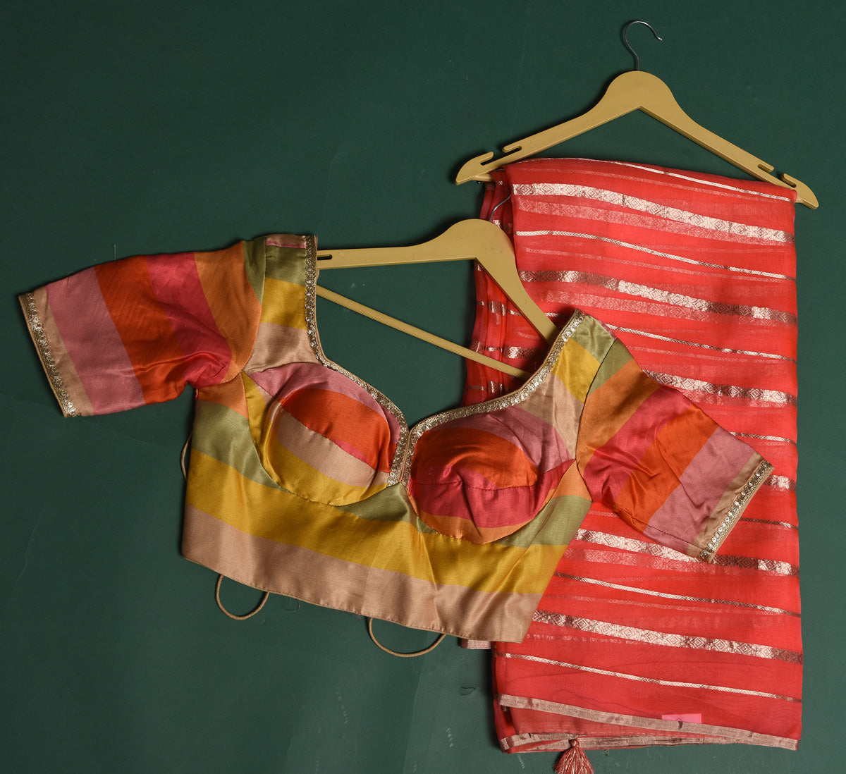 Buy beautiful coral pink organza saree online in USA with multicolor saree blouse. Slay ethnic style on special occasions with beautiful designer sarees, handwoven sarees, embroidered sarees, party wear sarees, Bollywood sarees from Pure Elegance Indian saree store in USA.-blouse