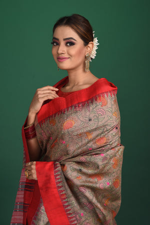 Shop elegant grey vidharba tussar printed saree online in USA with red border. Slay ethnic style on special occasions with beautiful designer sarees, handwoven sarees, embroidered sarees, party wear sarees, Bollywood sarees from Pure Elegance Indian saree store in USA.-closeup