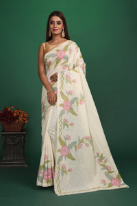 Elegance in simplicity! Our Rigel White Mulmul Saree is an epitome of beauty with its calm and soothing color and sheen texture. This saree is crafted in mulmul cotton that hugs you for effortless and comfortable styling. Style this up with jewelry pieces from our Dhatu collection for a simple and stylish look. Shop this designer saree from Pure Elegance Indian Fashion Store Online in USA.-Full view.