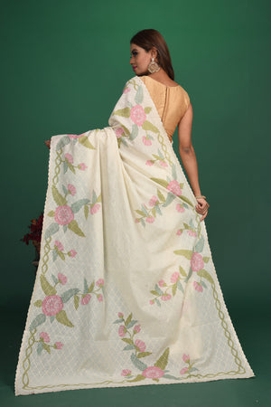 Elegance in simplicity! Our Rigel White Mulmul Saree is an epitome of beauty with its calm and soothing color and sheen texture. This saree is crafted in mulmul cotton that hugs you for effortless and comfortable styling. Style this up with jewelry pieces from our Dhatu collection for a simple and stylish look. Shop this designer saree from Pure Elegance Indian Fashion Store Online in USA.-Back view with open pallu.