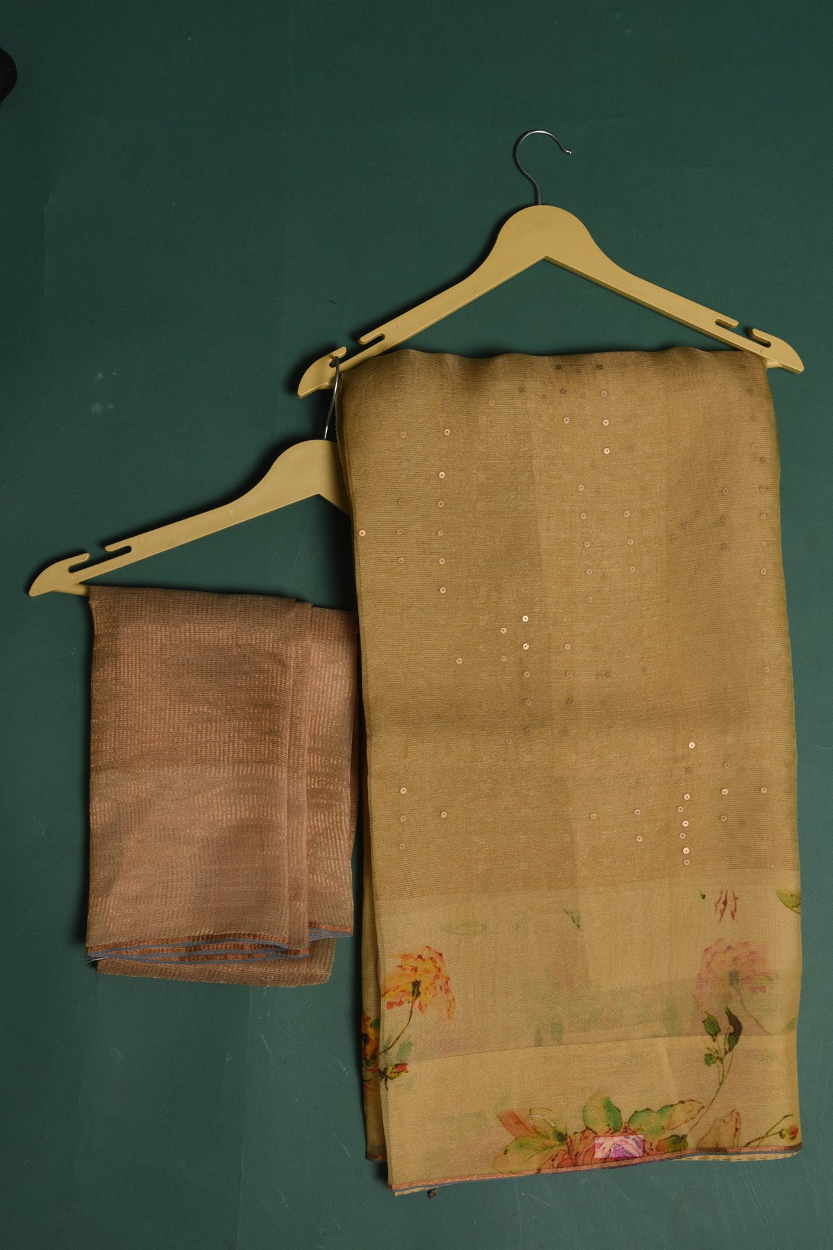 Buy this royal handcrafted weaving saree in cotton silk in light yellow color online in USA. It also has a Pallu with bronze weave and fringes. The entire saree has a Golden border and enhance with a beautiful floral pattern.  Make it yours and flaunt a handwoven marvel with minimal jewellery for a casual day outfit. Add this coton silk saree to your collection from Pure Elegance Indian fashion store in USA.-Unstitched blouse.